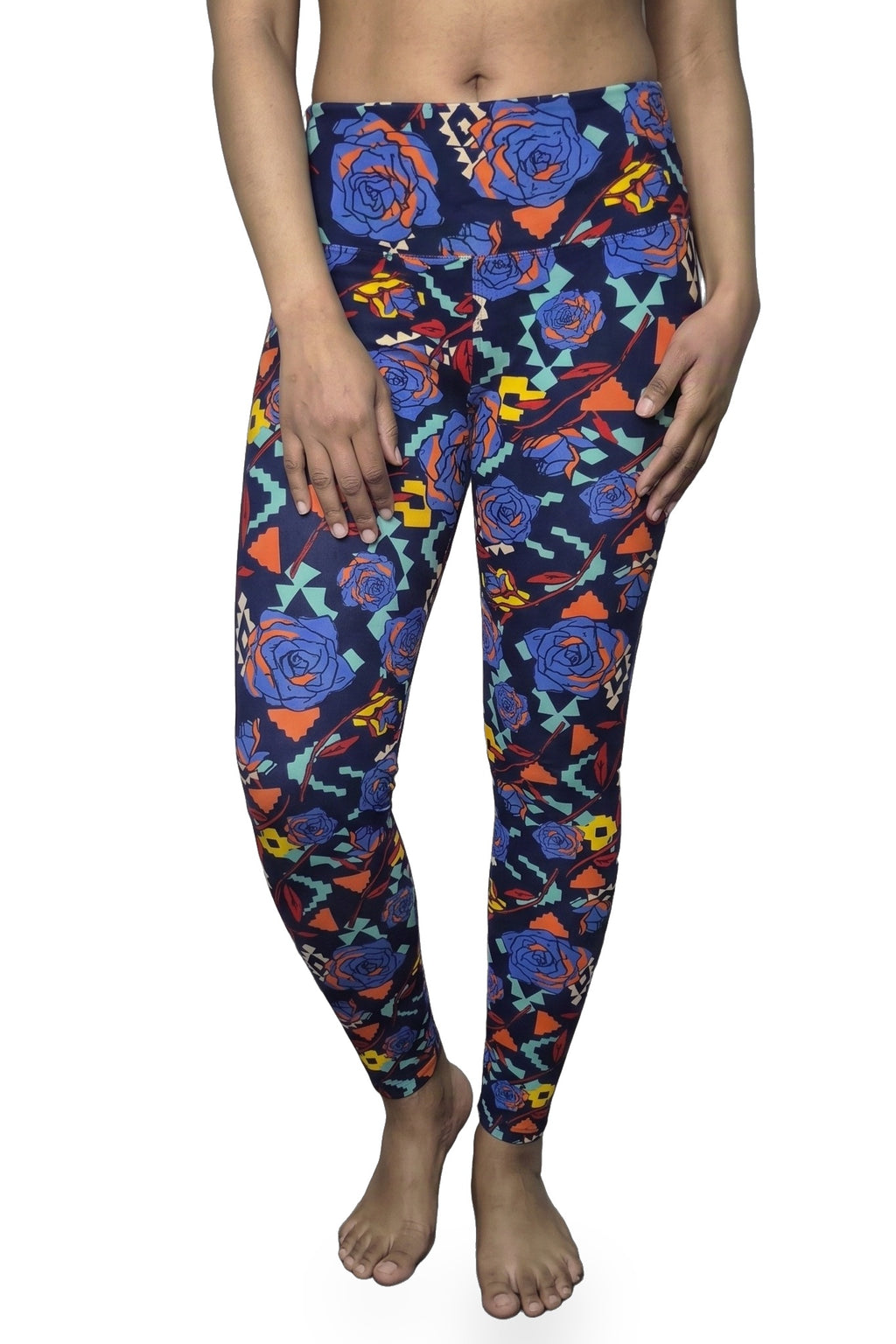 Side-front view of navy floral and geometric printed leggings showing mint, orange and yellow details